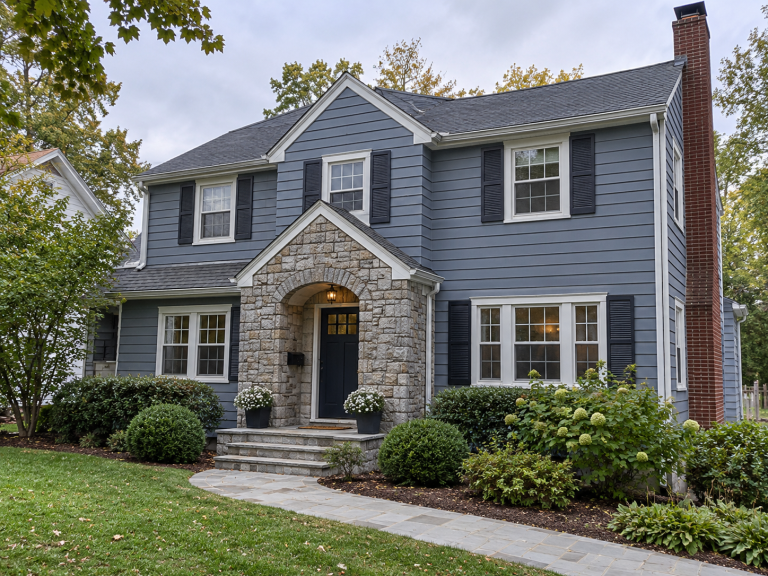 Blue clapboard house with a stone front entry and brick chimney, masonry in Crystal Lake